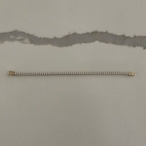 Gold tone and cz tennis bracelet